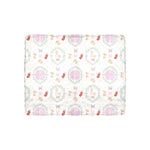 Patterned fabric with colorful designs on a white background